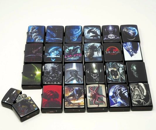 LOT of 24 Alien Mix Design Oil Lighter Flip Top Refillable Set